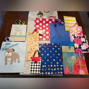 Set of 11 Colorful Gift Bags Set assorted styles and sizes. Total 11 bags